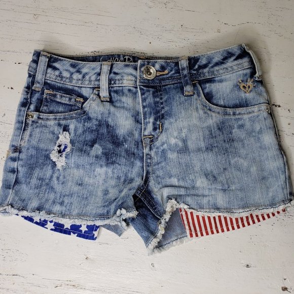 red and blue denim shorts
